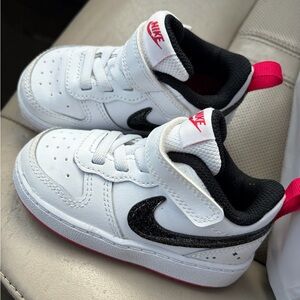 Nike Kids White and Black Sneakers with Red Accents